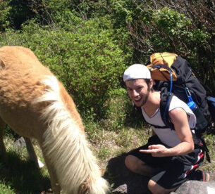 Nicus Employee Hiking with Horse